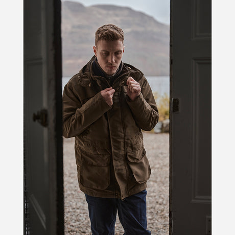 Lifestyle Image of Hoggs of Fife Kincraig Waterproof Field Jacket Olive Green - Wild & Moor