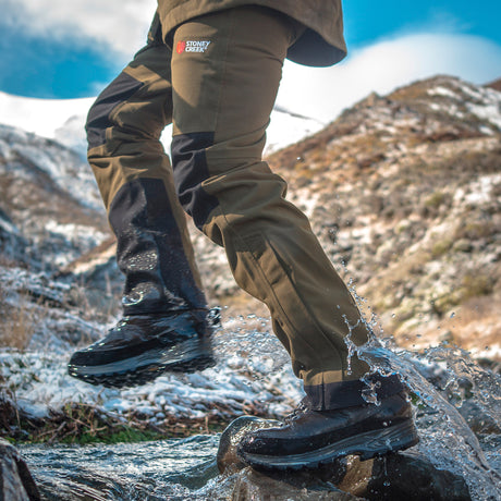 Lifestyle image of Stoney Creek Mens Tundra Waterproof Overtrousers - Wild & Moor